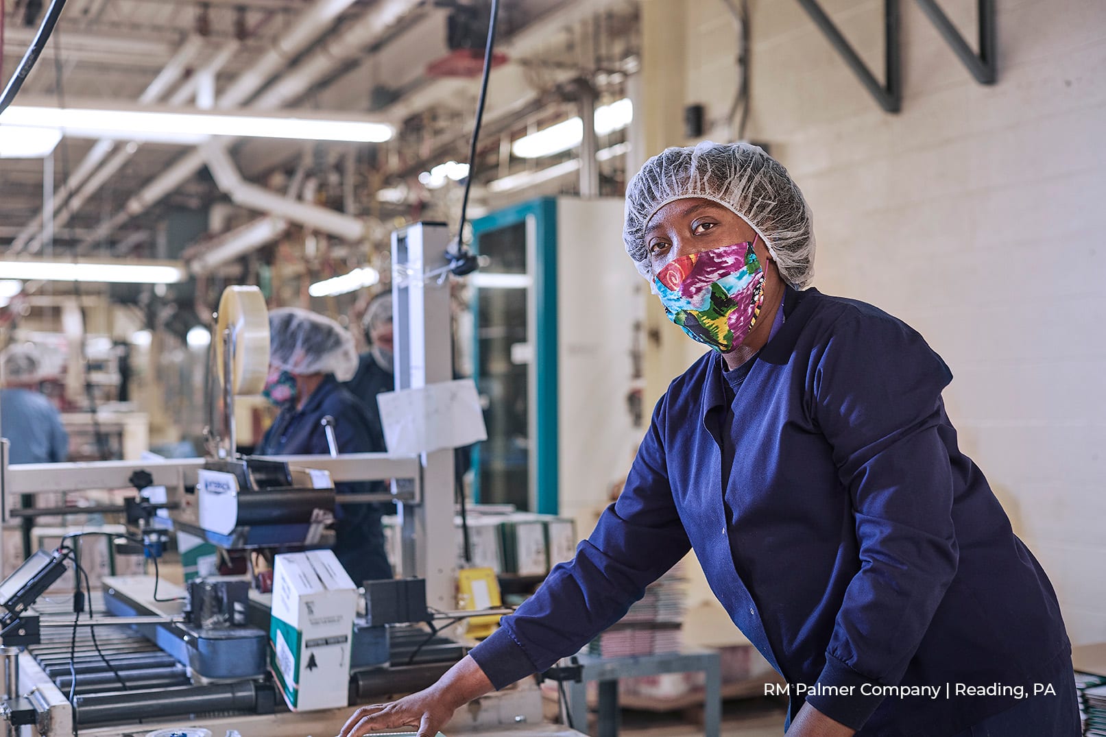 RM Palmer Company | Reading, PA female worker in PPE at RM Palmer Company in Reading, PA